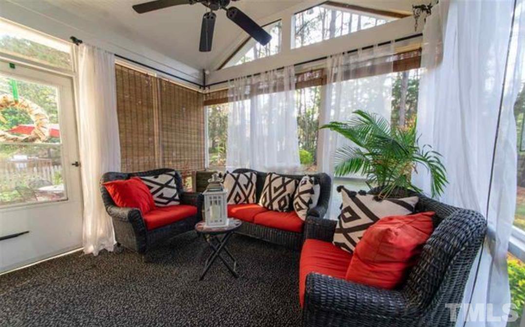7613 Overland Trail Raleigh, NC 27615 - Photo 15 of 22 a view of a room with furniture and a potted plant