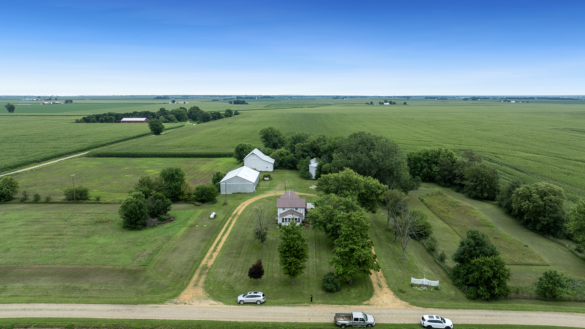 a view of a golf course with a lake