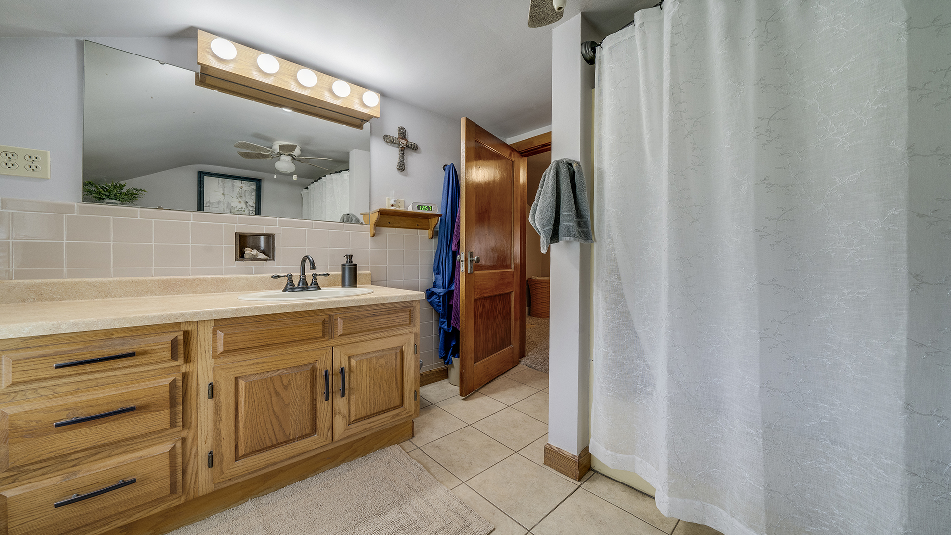 1018 Hoyle Road Harmon, IL 61042 - Photo 22 of 41 a spacious bathroom with a double vanity sink a and a mirror