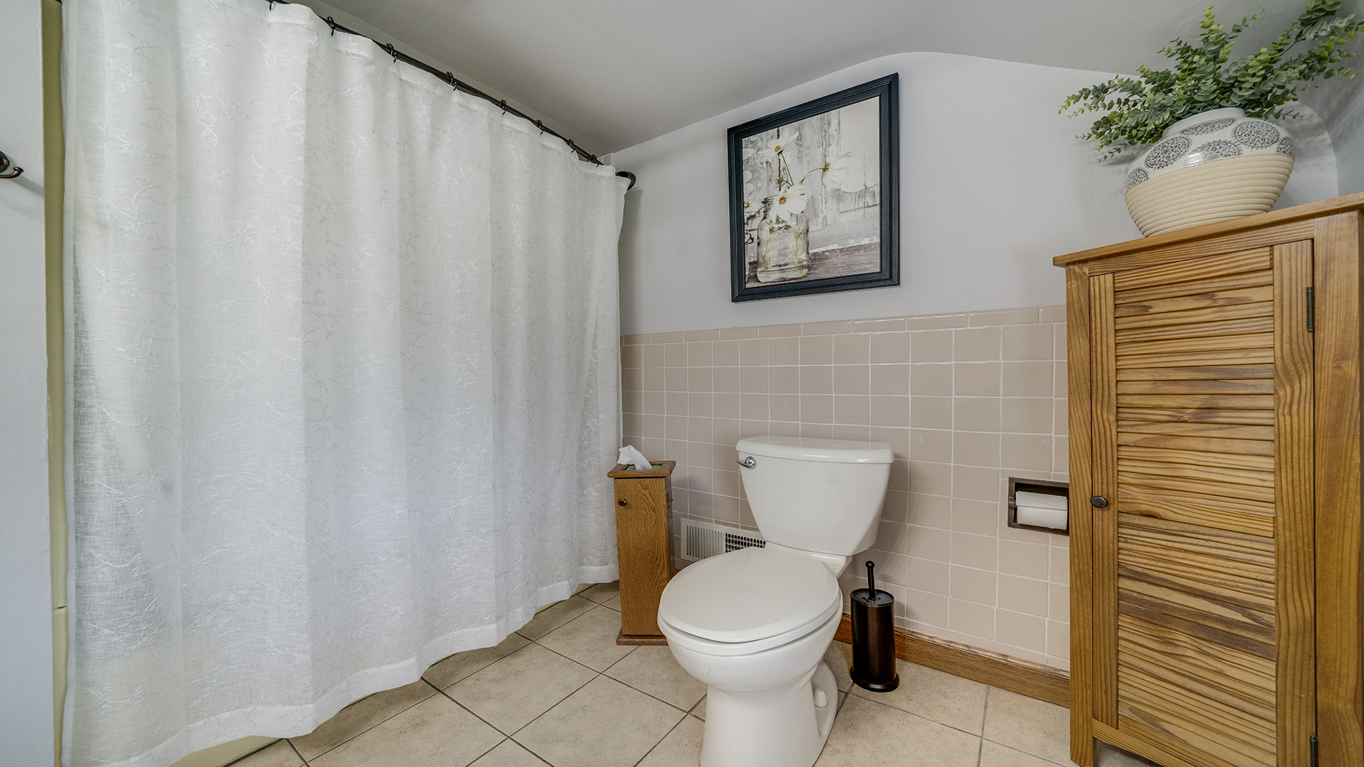 1018 Hoyle Road Harmon, IL 61042 - Photo 23 of 41 a white toilet sitting next to a shower curtain