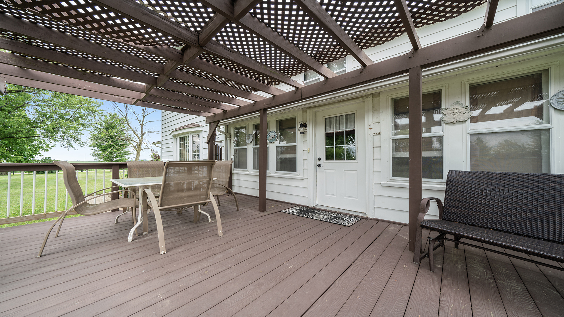 1018 Hoyle Road Harmon, IL 61042 - Photo 32 of 41 a view of a patio with table and chairs wooden floor with wooden floor
