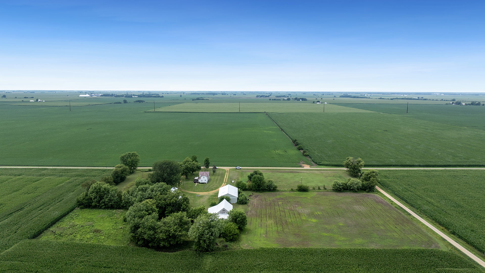1018 Hoyle Road Harmon, IL 61042 - Photo 4 of 41 a view of a lake with a building in the background