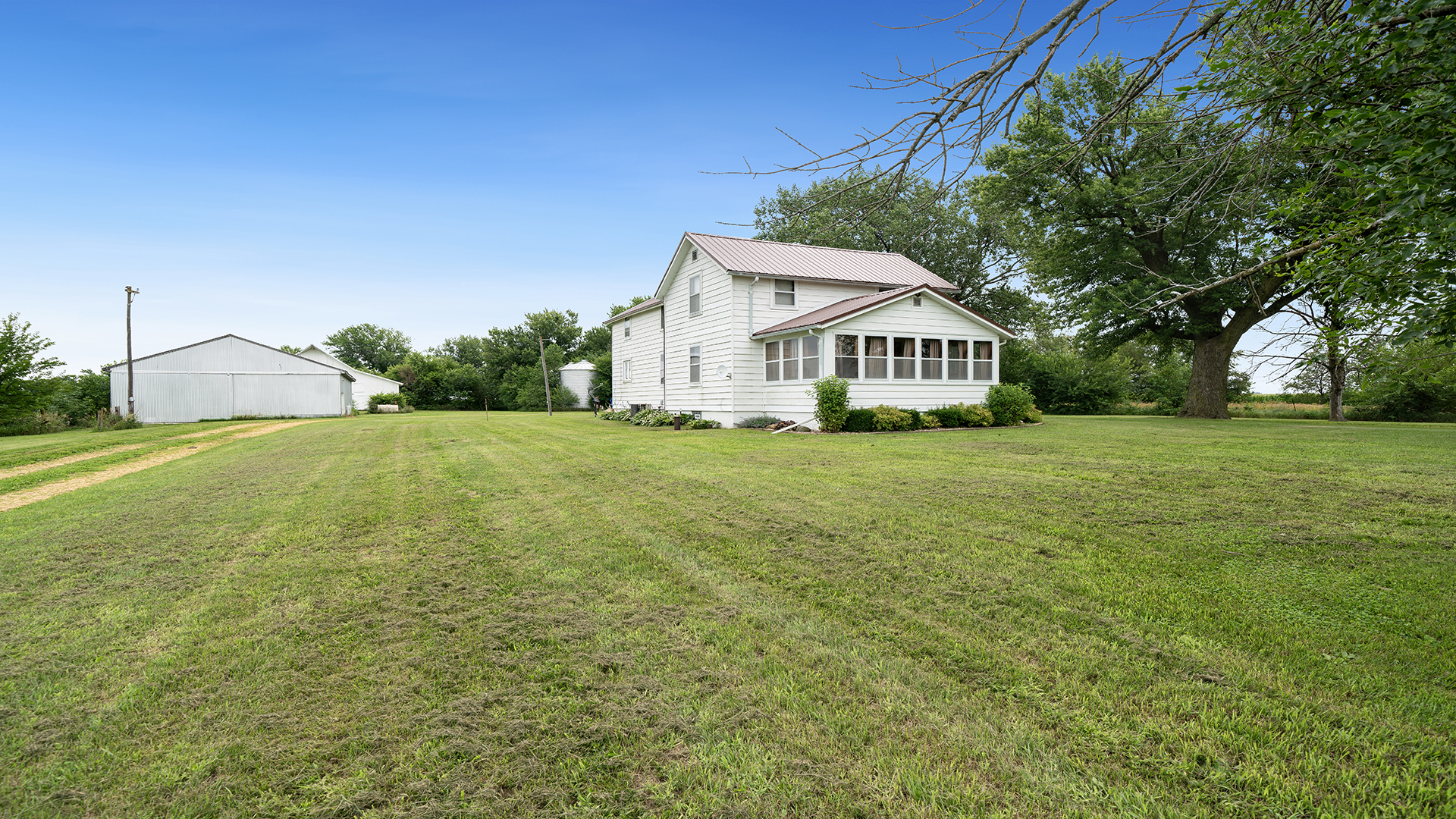 1018 Hoyle Road Harmon, IL 61042 - Photo 41 of 41 a view of a house next to a big yard and large trees