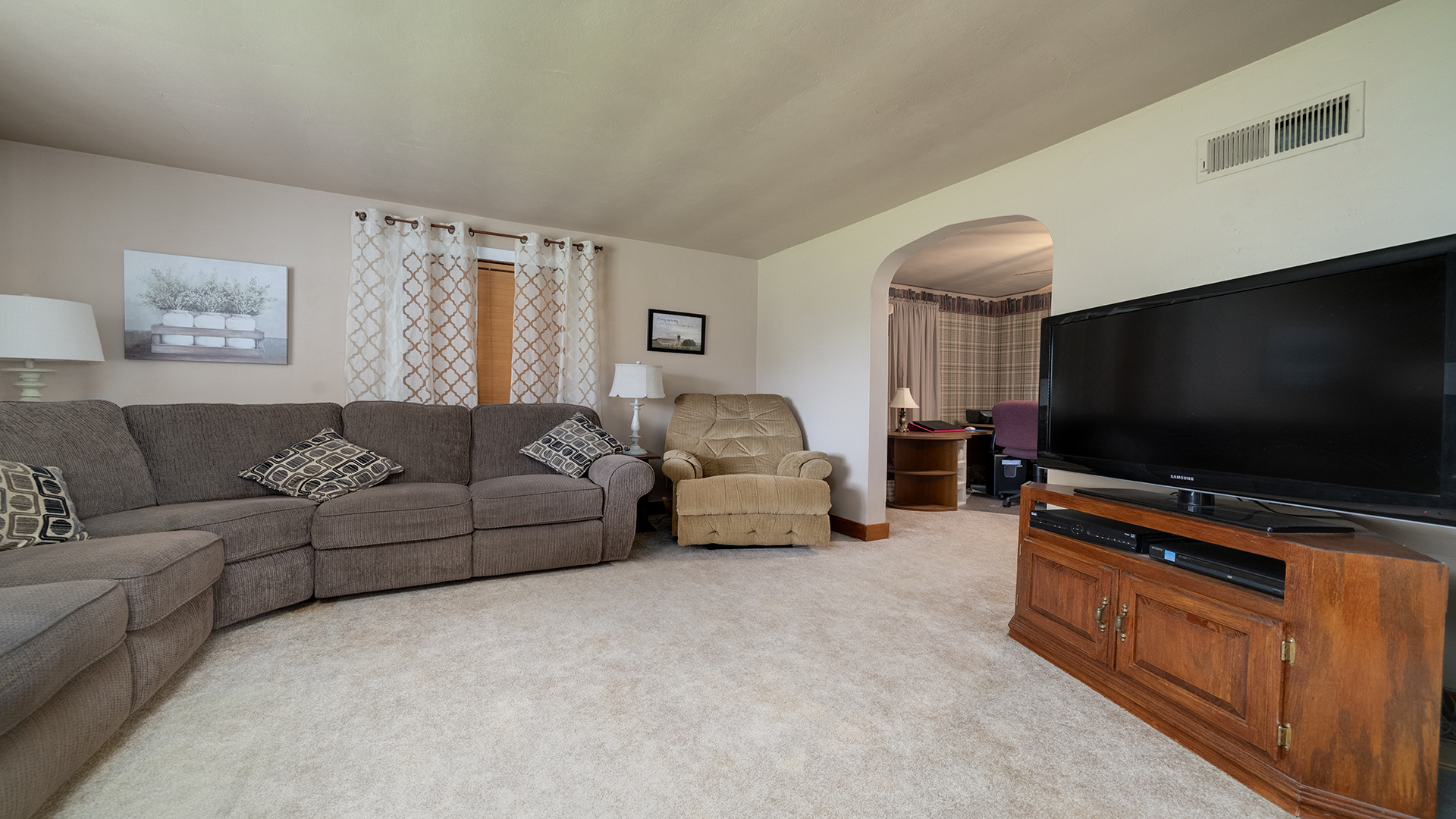 1018 Hoyle Road Harmon, IL 61042 - Photo 9 of 41 a living room with furniture and a flat screen tv