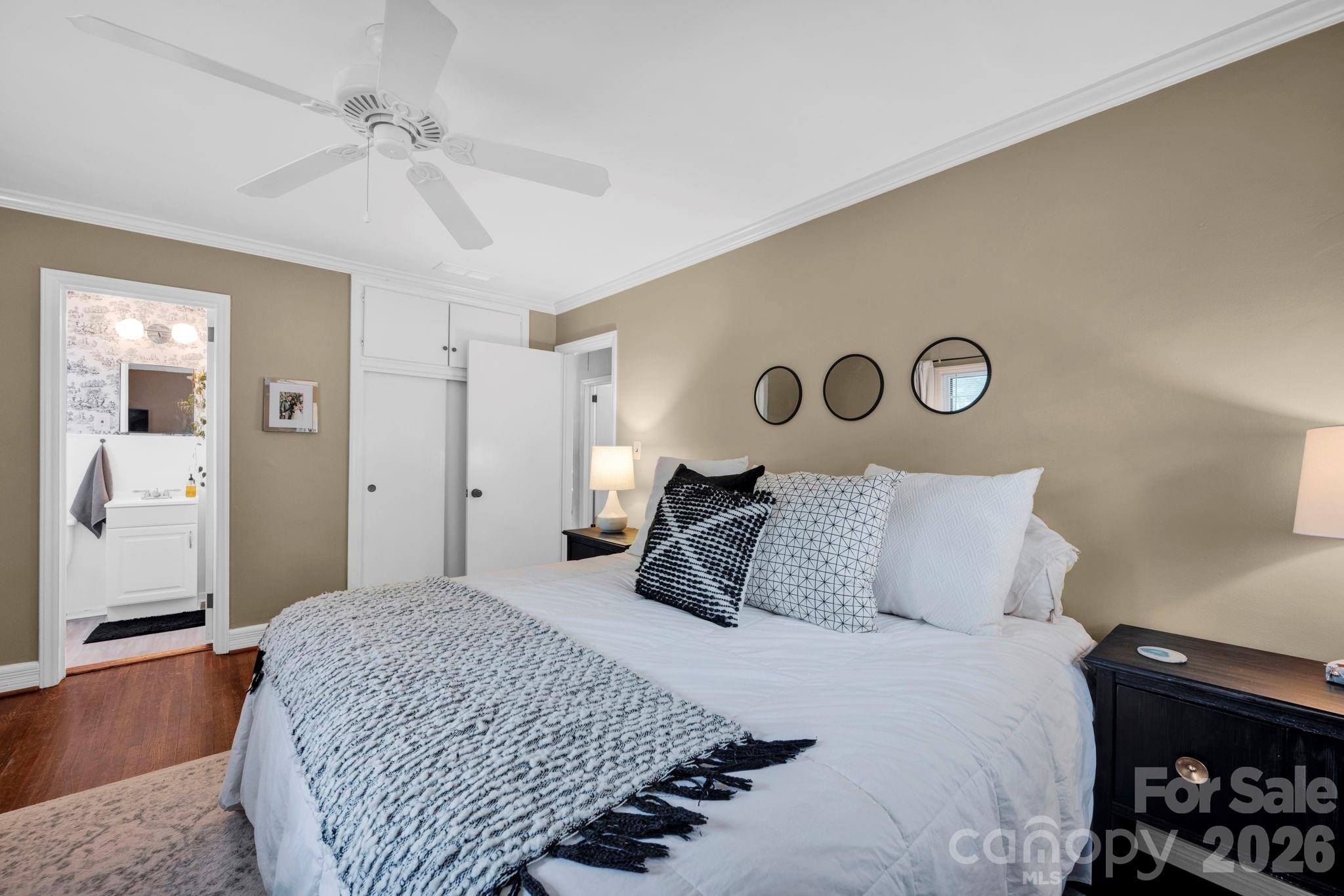 1227 Barkley Road Charlotte, NC 28209 - Photo 17 of 37 a bedroom with a bed and dresser