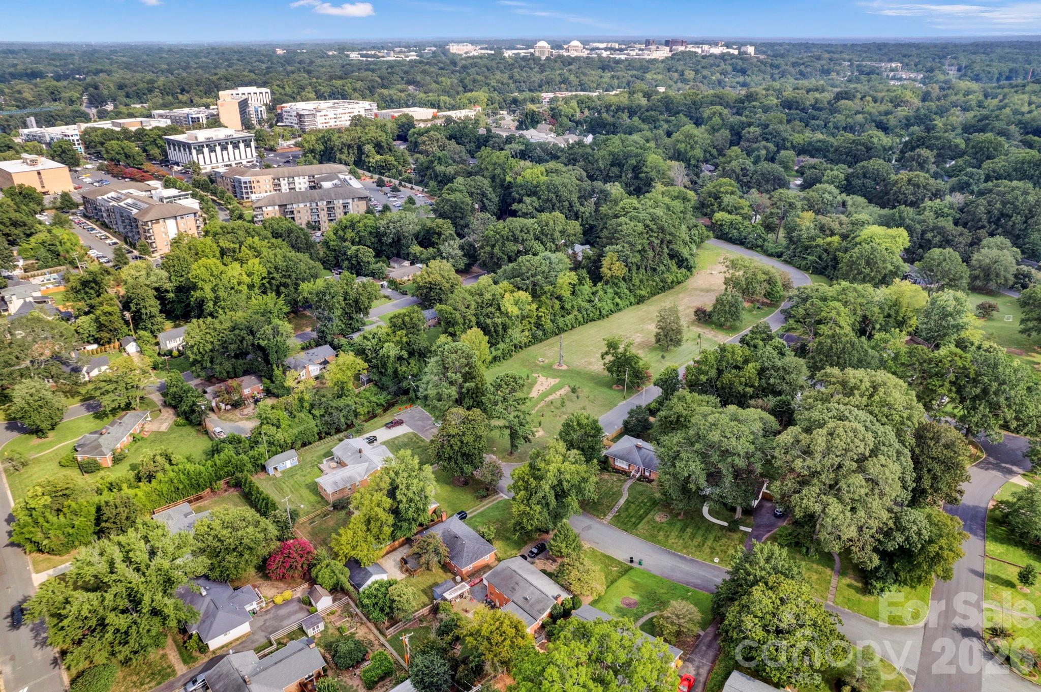 1227 Barkley Road Charlotte, NC 28209 - Photo 28 of 37 an aerial view of a city with lots of residential buildings