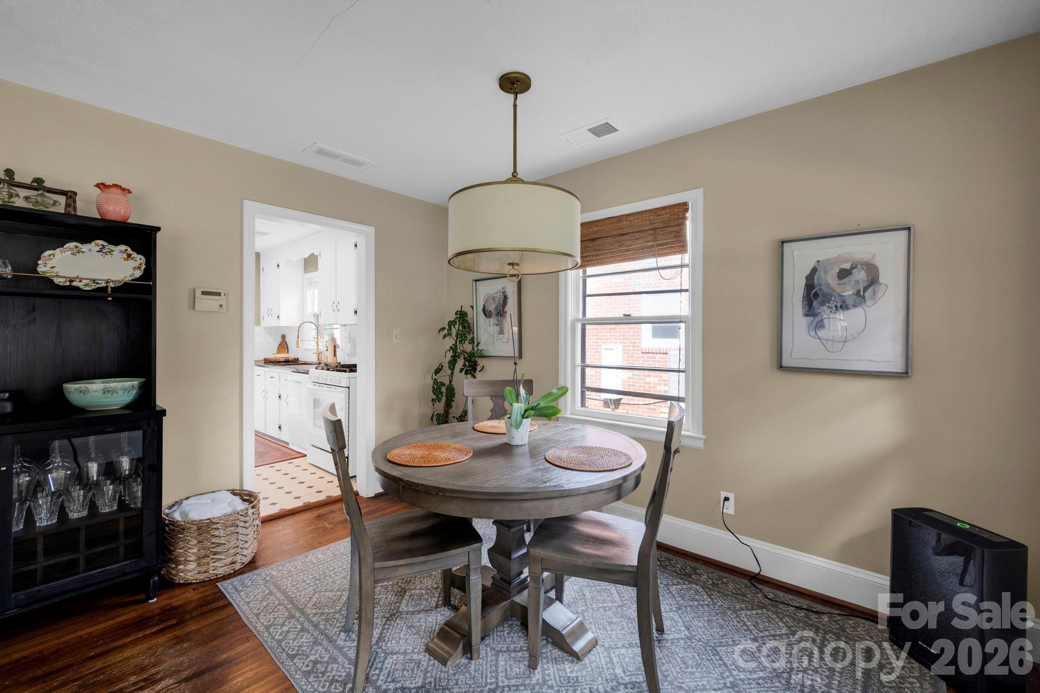 1227 Barkley Road Charlotte, NC 28209 - Photo 8 of 37 a dining room with furniture and window