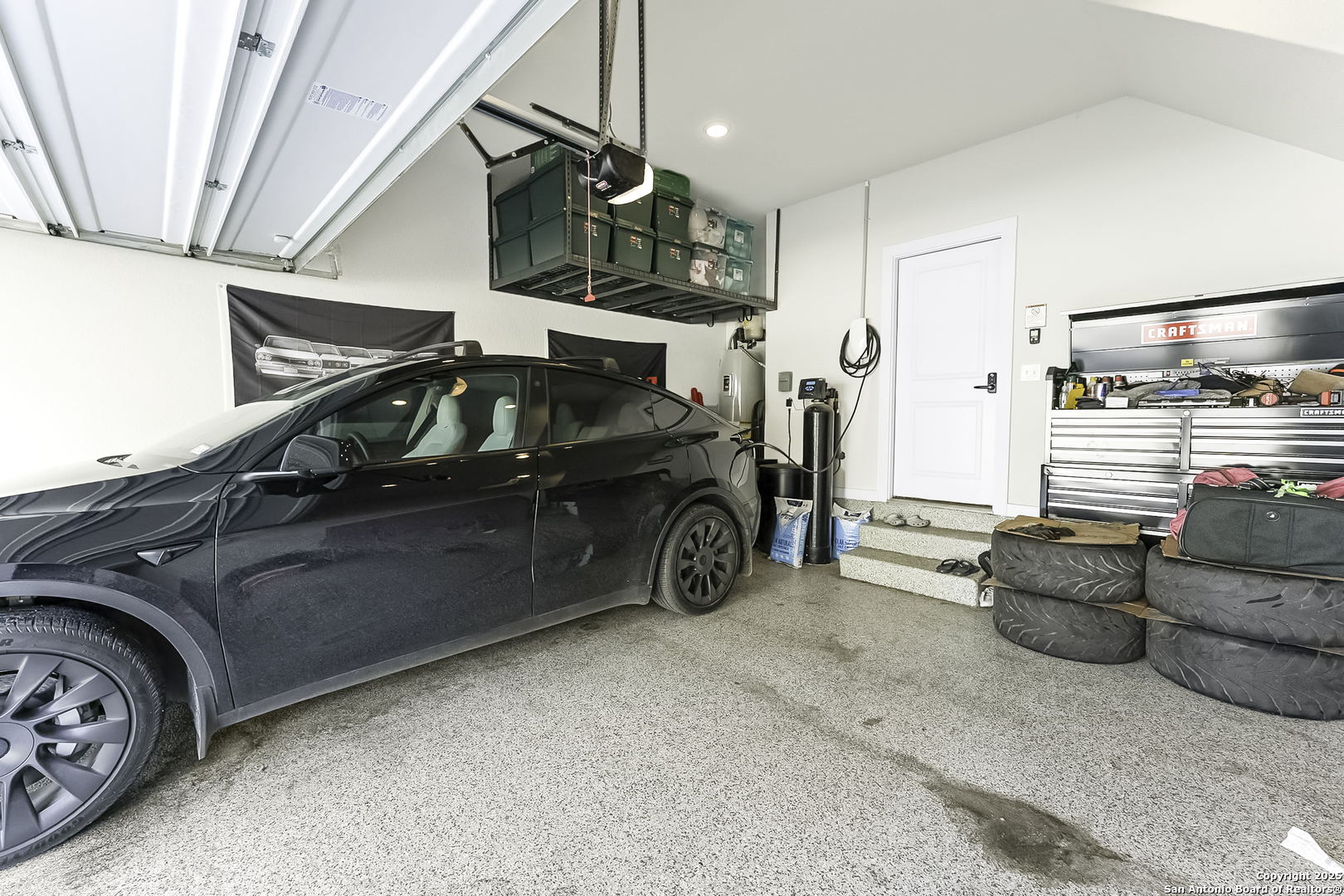 6446 Babcock Road, Unit 27 San Antonio, TX 78249 - Photo 22 of 22 a car parked in a garage