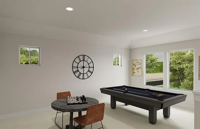 a bedroom with a bed a window and a lamp on table