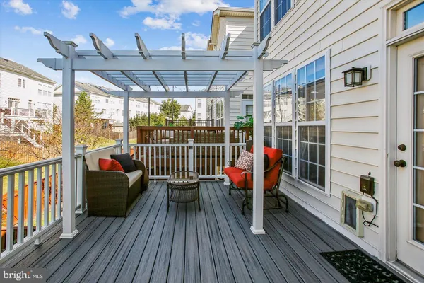 a view of a balcony with furniture