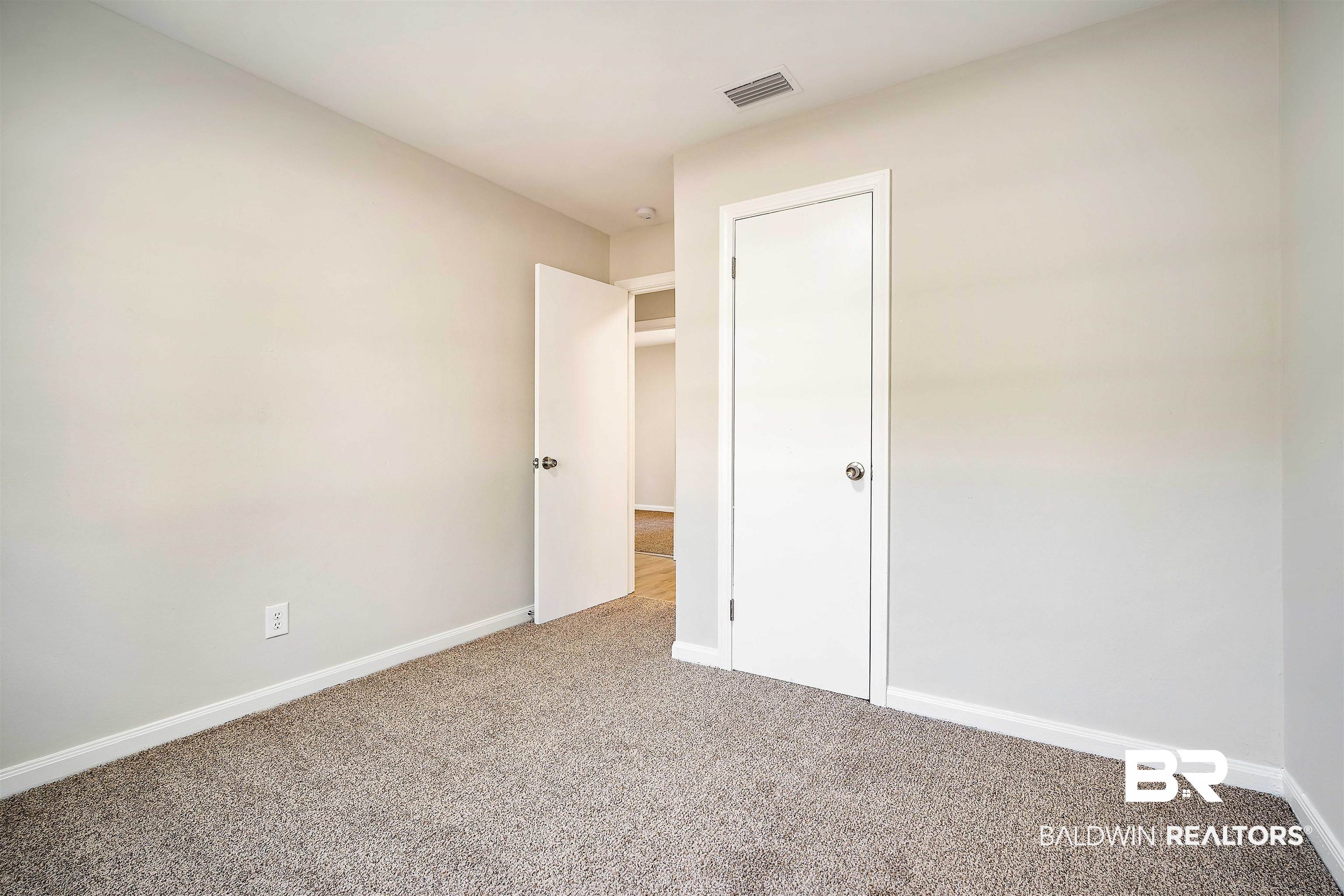 662 Merritt Drive Mobile, AL 36609 - Photo 17 of 21 Unfurnished bedroom featuring carpet