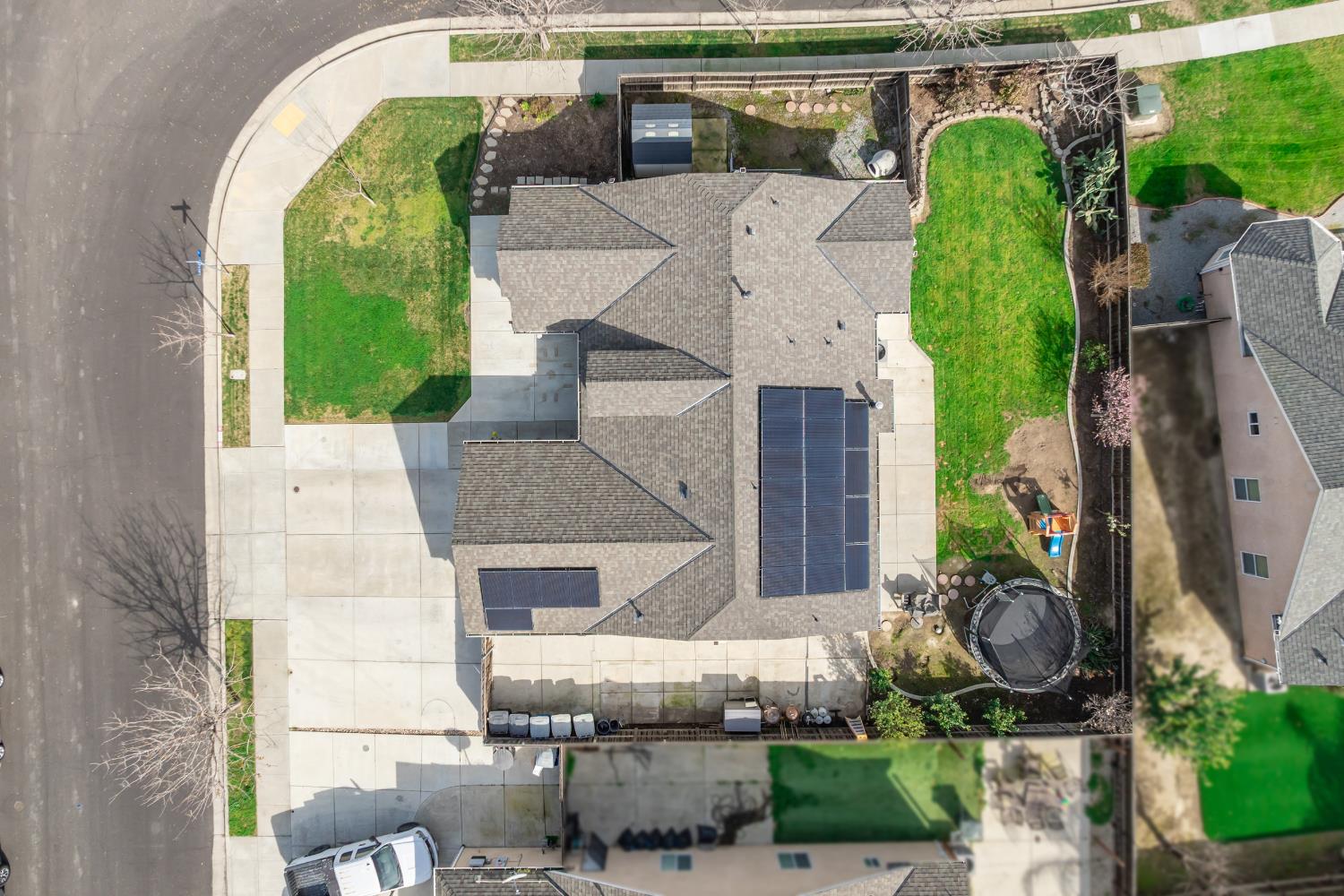 1116 Liberation Way Lemoore, CA 93245 - Photo 11 of 43 an aerial view of a house with garden space and street view
