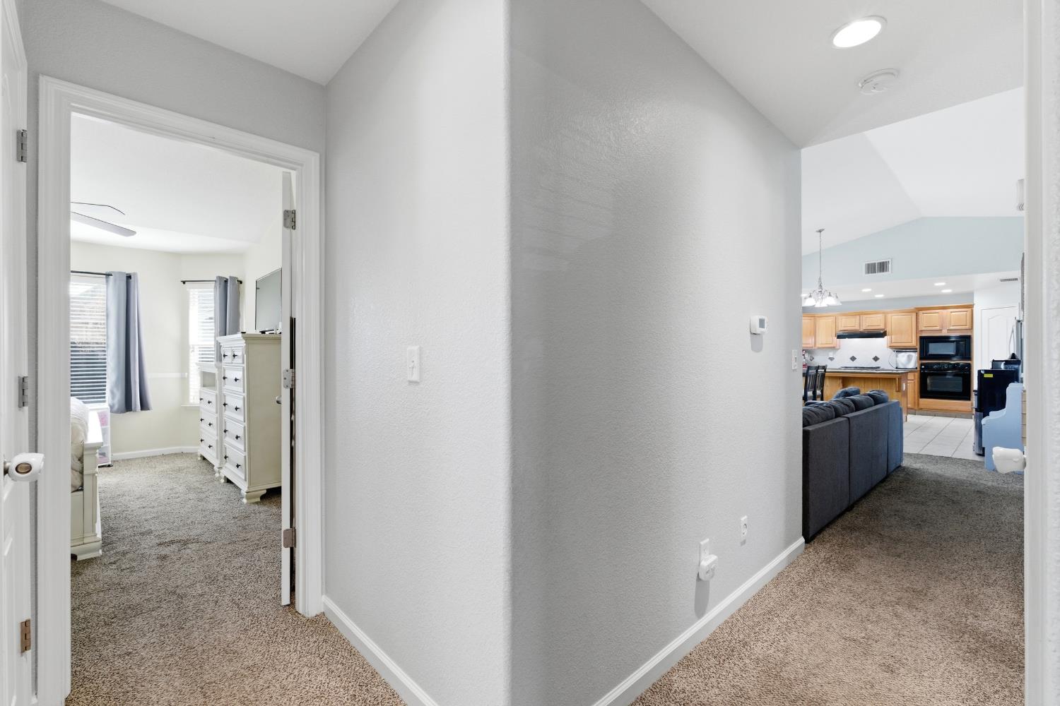 1116 Liberation Way Lemoore, CA 93245 - Photo 15 of 43 a view of a hallway with living room