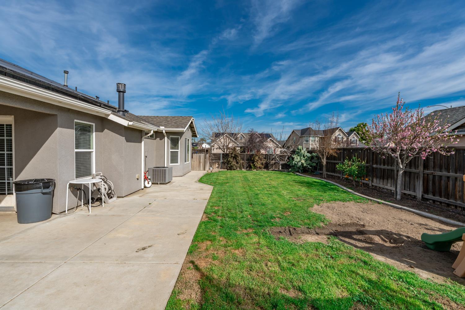 1116 Liberation Way Lemoore, CA 93245 - Photo 30 of 43 a view of a backyard with sitting area
