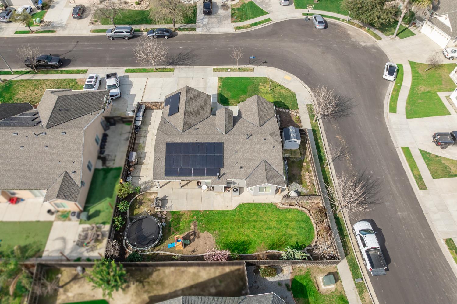 1116 Liberation Way Lemoore, CA 93245 - Photo 38 of 43 an aerial view of a house with a yard