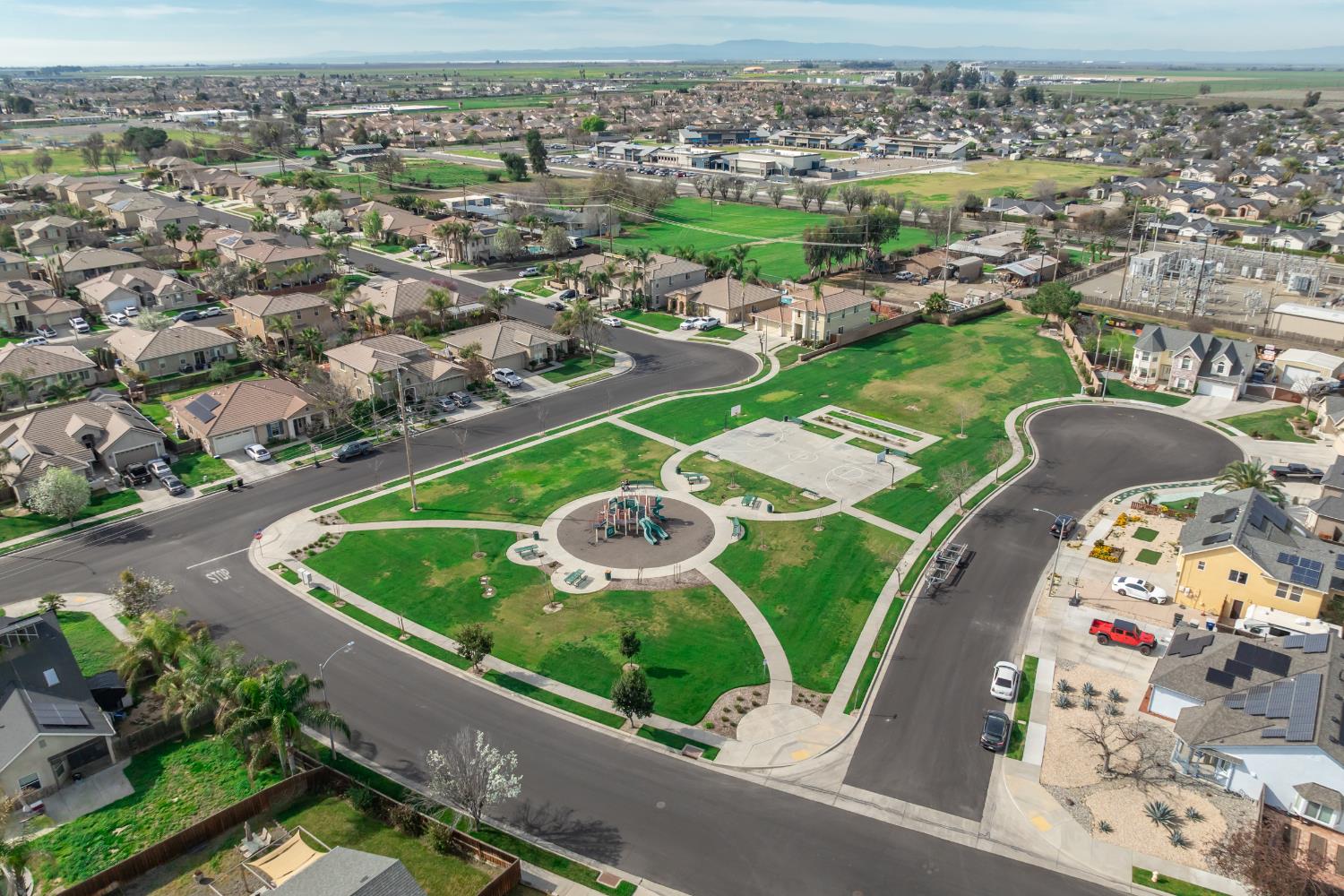 1116 Liberation Way Lemoore, CA 93245 - Photo 41 of 43 an aerial view of a house with a swimming pool