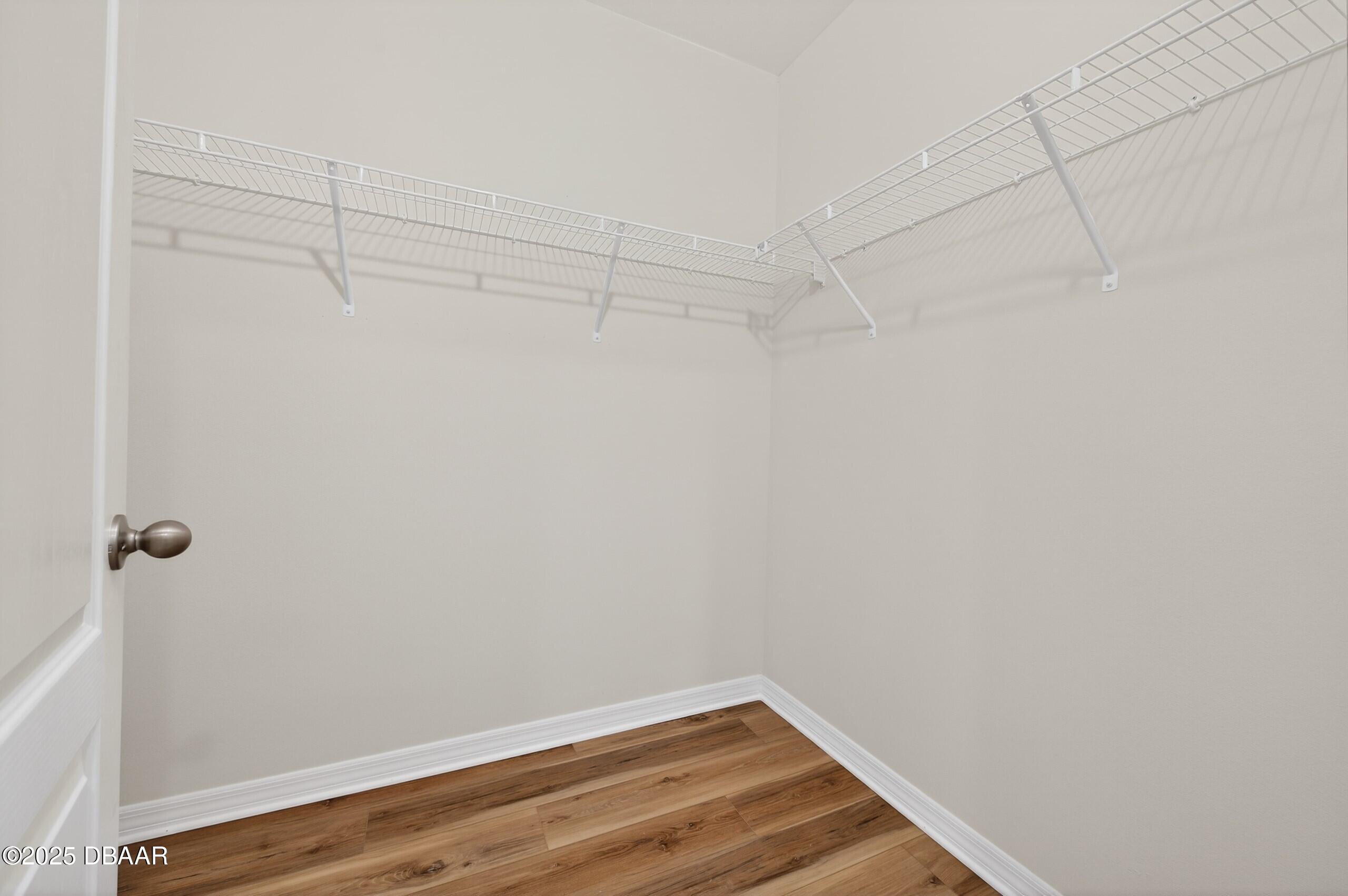 54 Bella Oaks Drive Port Orange, FL 32129 - Photo 20 of 32 a view of a room with racks on the wall