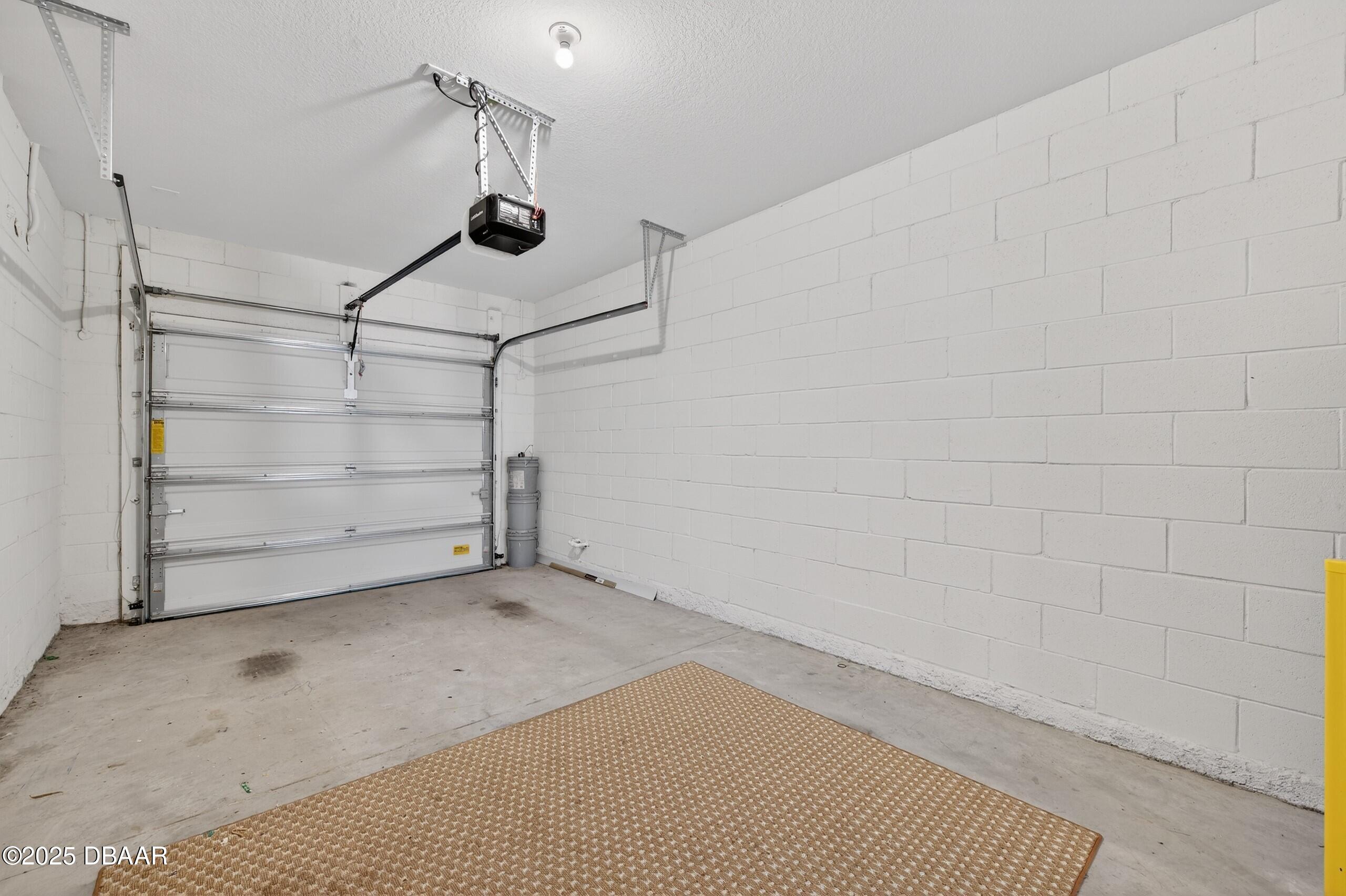 54 Bella Oaks Drive Port Orange, FL 32129 - Photo 24 of 32 a view of a room with racks on the wall