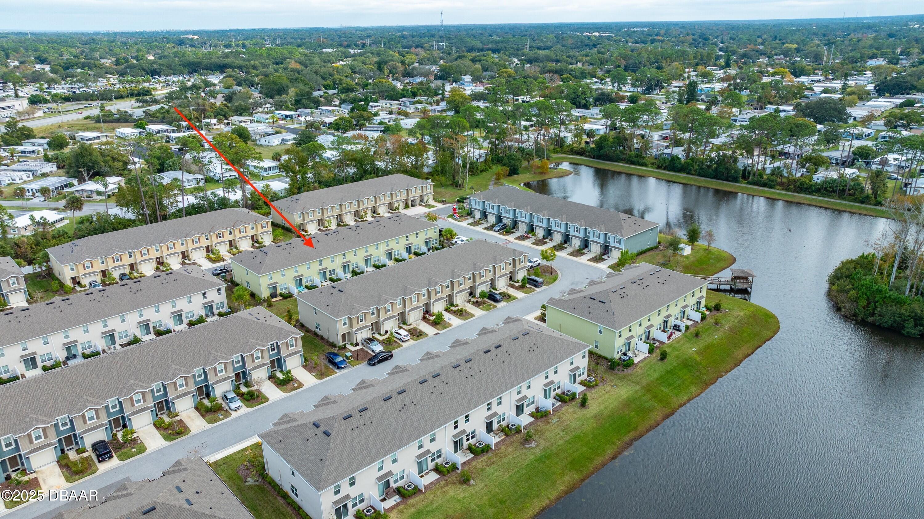 54 Bella Oaks Drive Port Orange, FL 32129 - Photo 31 of 32 an aerial view of a house with a garden