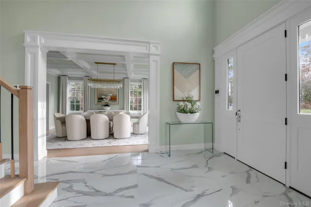 a bedroom with a bed and a mirror