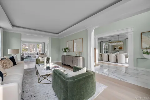 a living room with furniture and view of living room