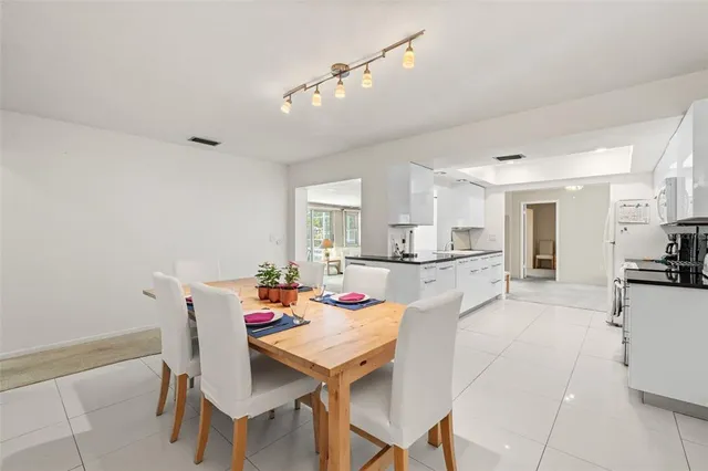 a bedroom with a bed and a table