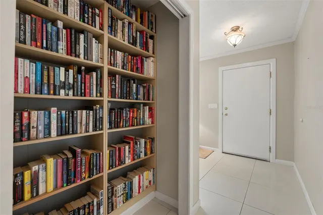 a view of an empty room with shelves