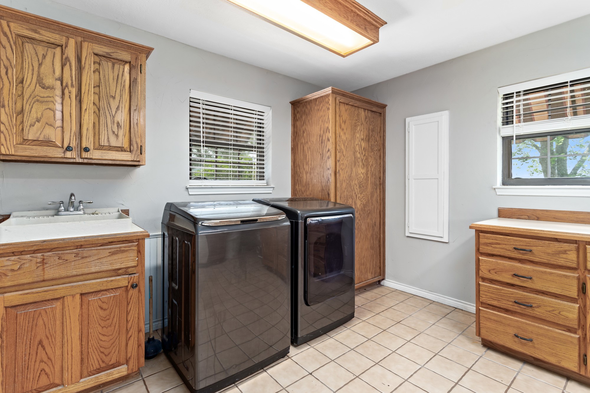 1747 Farm To Market Road 365 Nome, TX 77629 - Photo 21 of 24 a kitchen with granite countertop cabinets and window