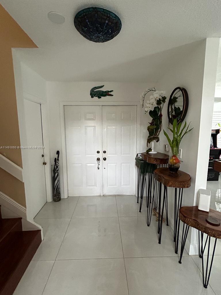 Marbella Park Hialeah, FL 33015 - Photo 3 of 24 a view of a livingroom with furniture and a dinning area