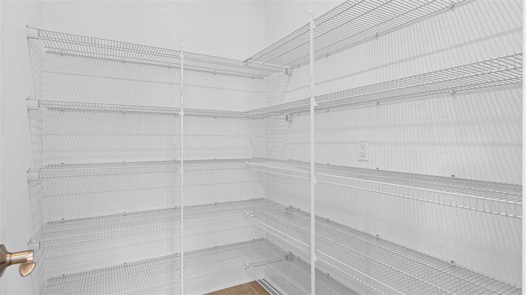 1520 Southeast Savoy Way Stuart, FL 34997 - Photo 20 of 39 a view of a room with shelf