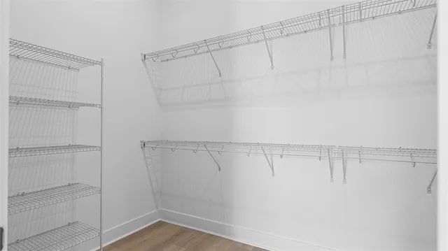 a view of a room with racks on the wall