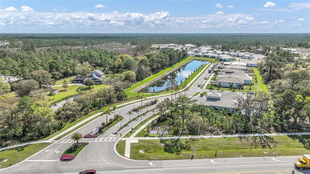 1520 Southeast Savoy Way Stuart, FL 34997 - Photo 37 of 37 a view of a lake with a mountain in the background