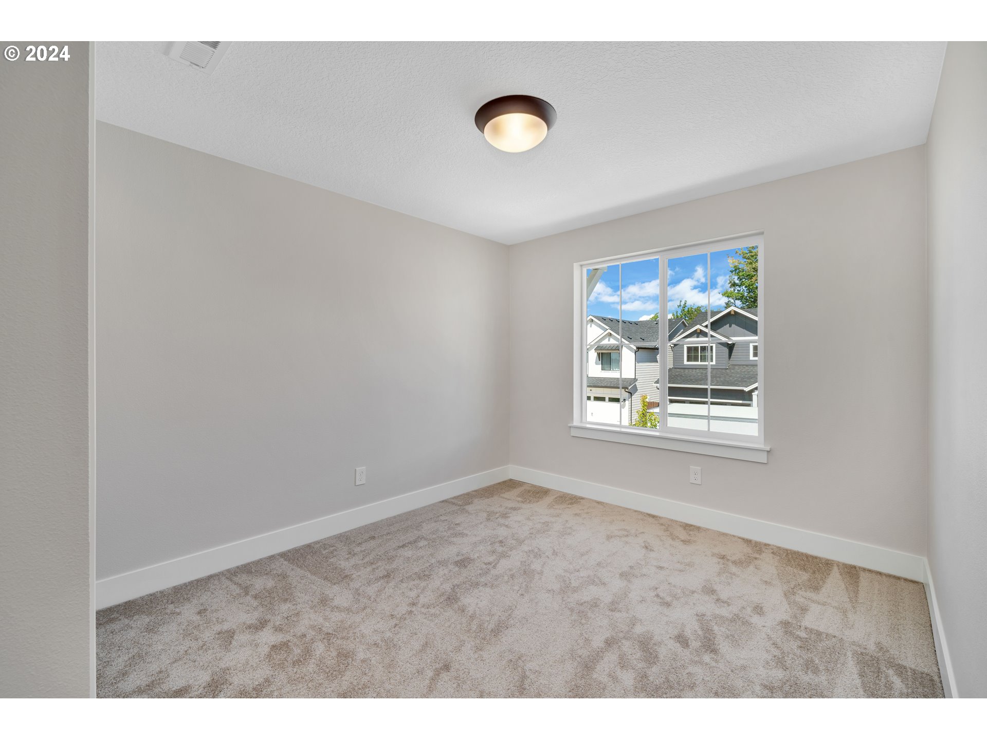 17538 Northwest 7th Avenue Ridgefield, WA 98642 - Photo 11 of 18 a view of empty room with window
