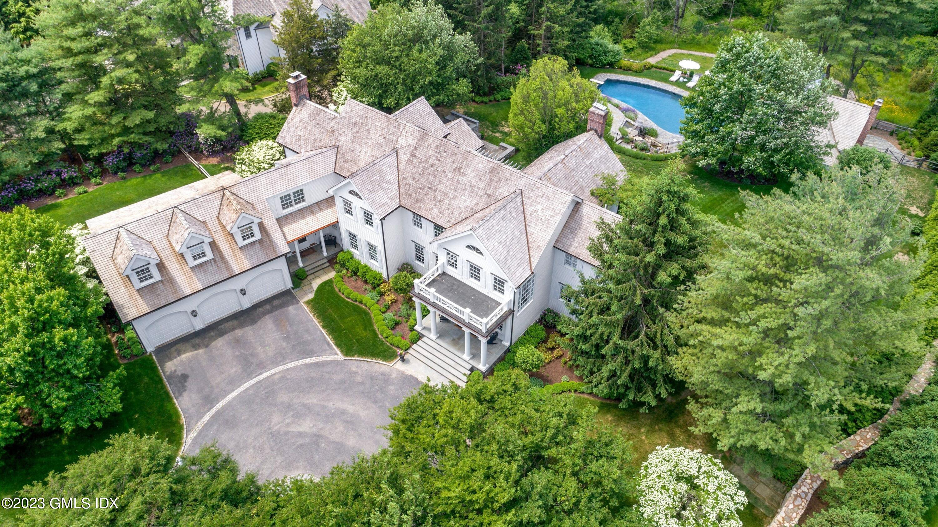 400 Stanwich Road Greenwich, CT 06830 - Photo 33 of 37 an aerial view of a house with garden space and street view