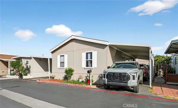 a front view of a house with a garage