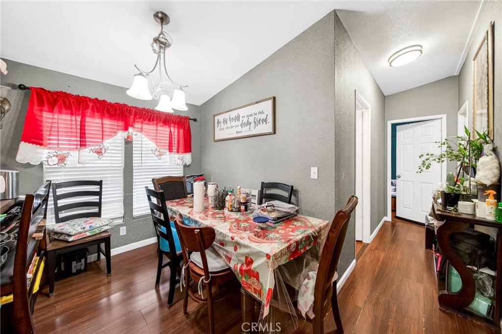 1241 North East Street Anaheim, CA 92805 - Photo 5 of 8 a view of a dining room with furniture window and wooden floor