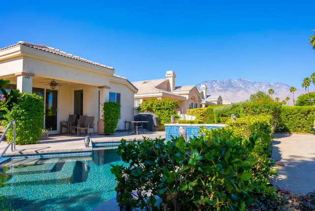 a view of a house with a swimming pool