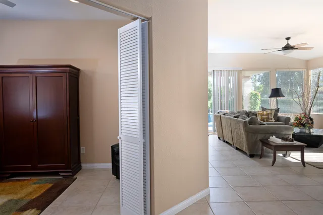 a view of a livingroom with furniture and a piano