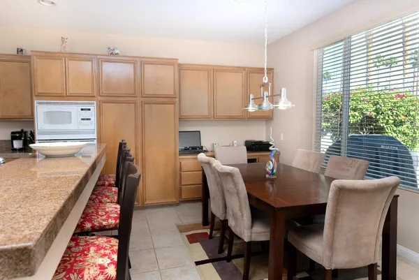 a view of a dining room with furniture