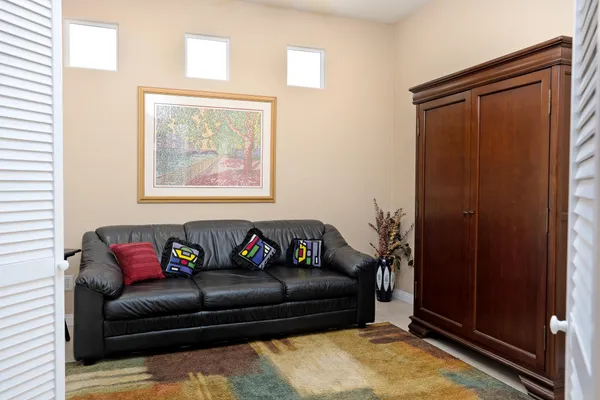 a living room with furniture and a window