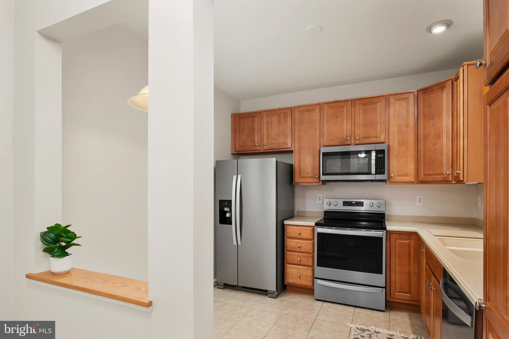 7315 Maplecrest Road, Unit 105 Elkridge, MD 21075 - Photo 6 of 52 Foyer to Kitchen