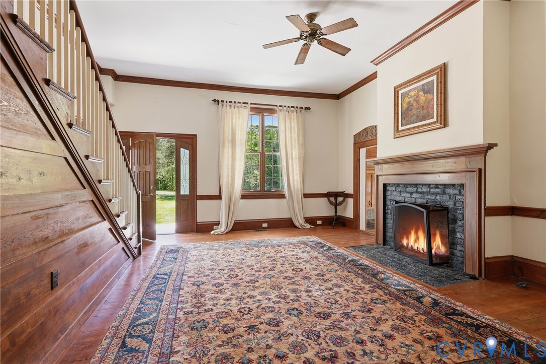 3355 Duke Road Powhatan, VA 23139 - Photo 11 of 67 a living room with a fireplace and a rug