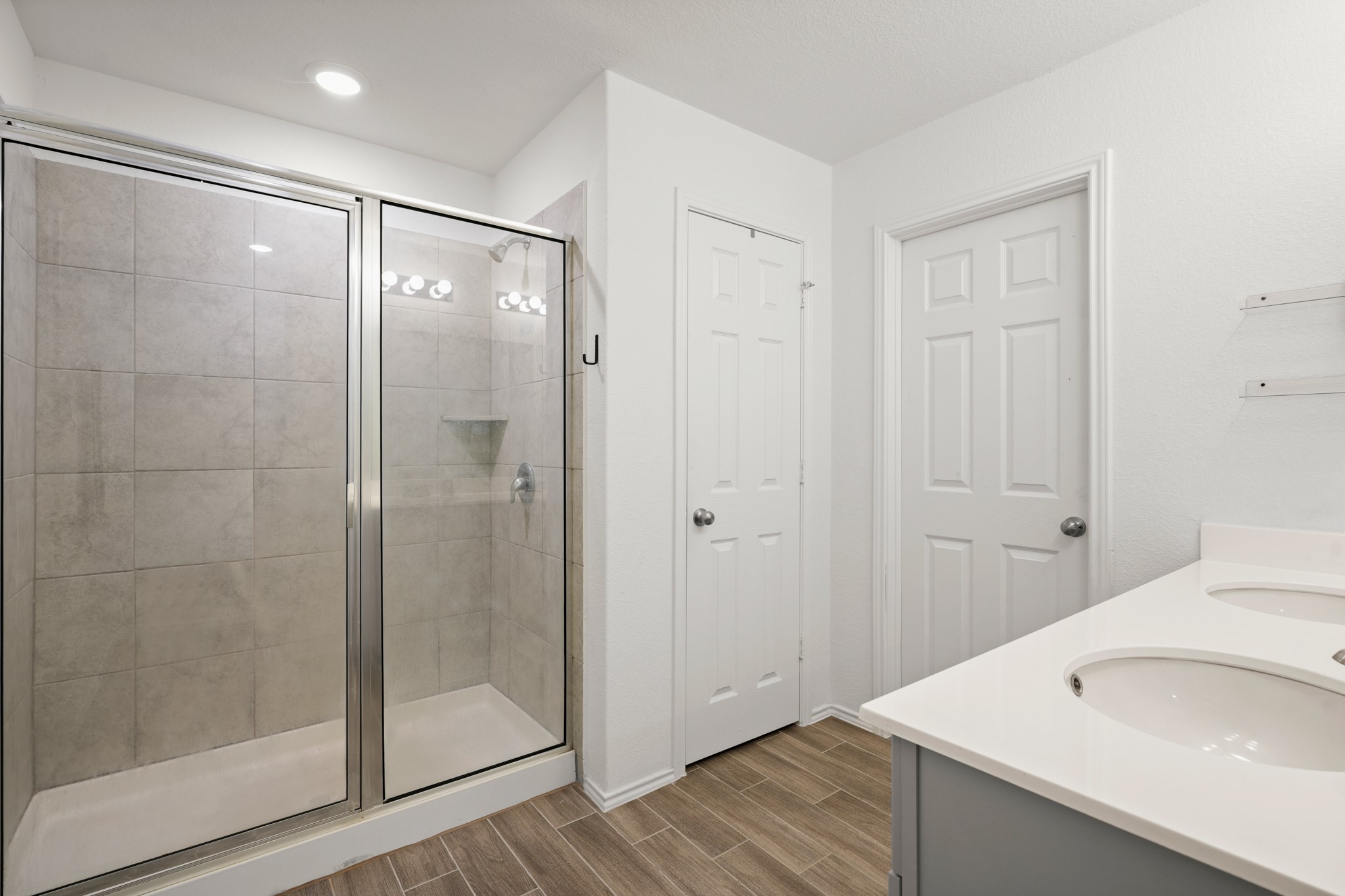 500 Pickrell Loop Georgetown, TX 78628 - Photo 16 of 29 a bathroom with a shower and a sink