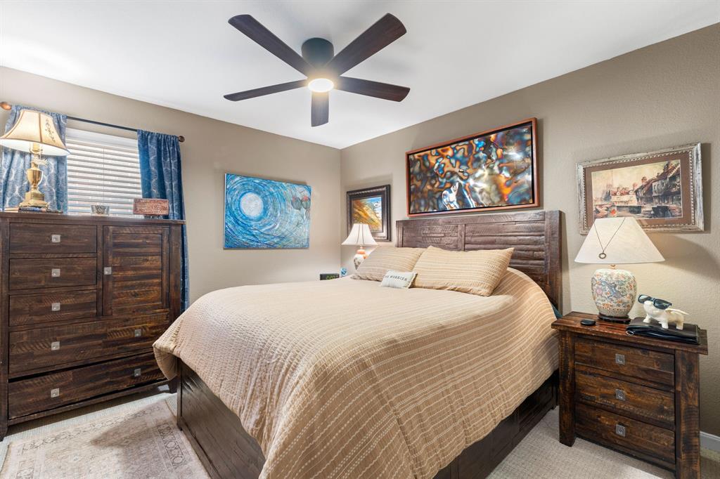 300 Copper Switch Drive Anna, TX 75409 - Photo 19 of 26 This room features a ceiling fan, a window with blinds, walk in closet, and neutral-toned carpet