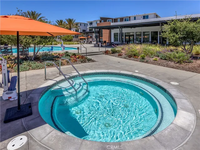 a view of a swimming pool with a patio