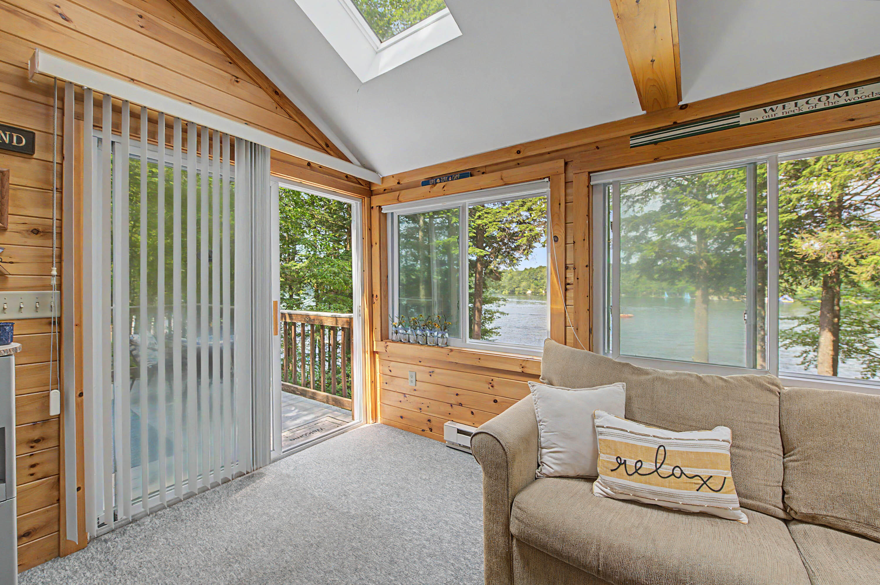 137 Coffee Pond Road Casco, ME 04015 - Photo 10 of 20 Great room leading to deck