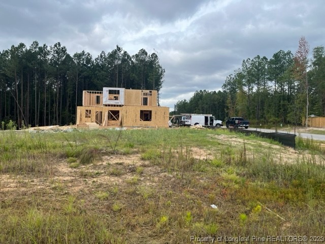 16 Hancock Road Cameron, NC 28326 - Photo 4 of 5 a view of a house with a yard