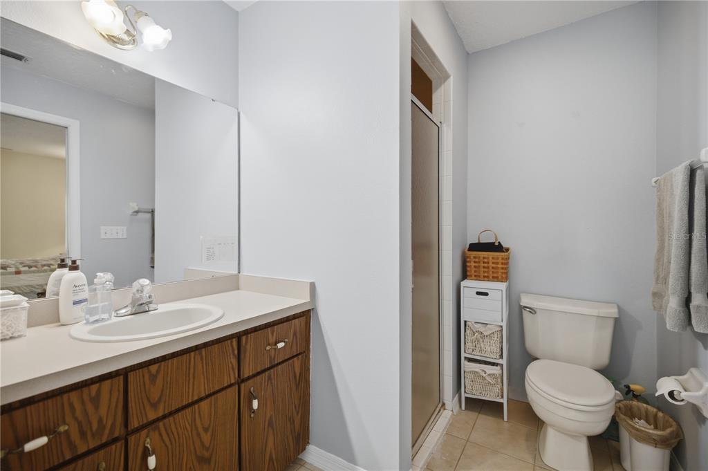 17900 Northwest 120th Avenue Road Reddick, FL 32686 - Photo 31 of 45 a bathroom with a sink toilet and mirror
