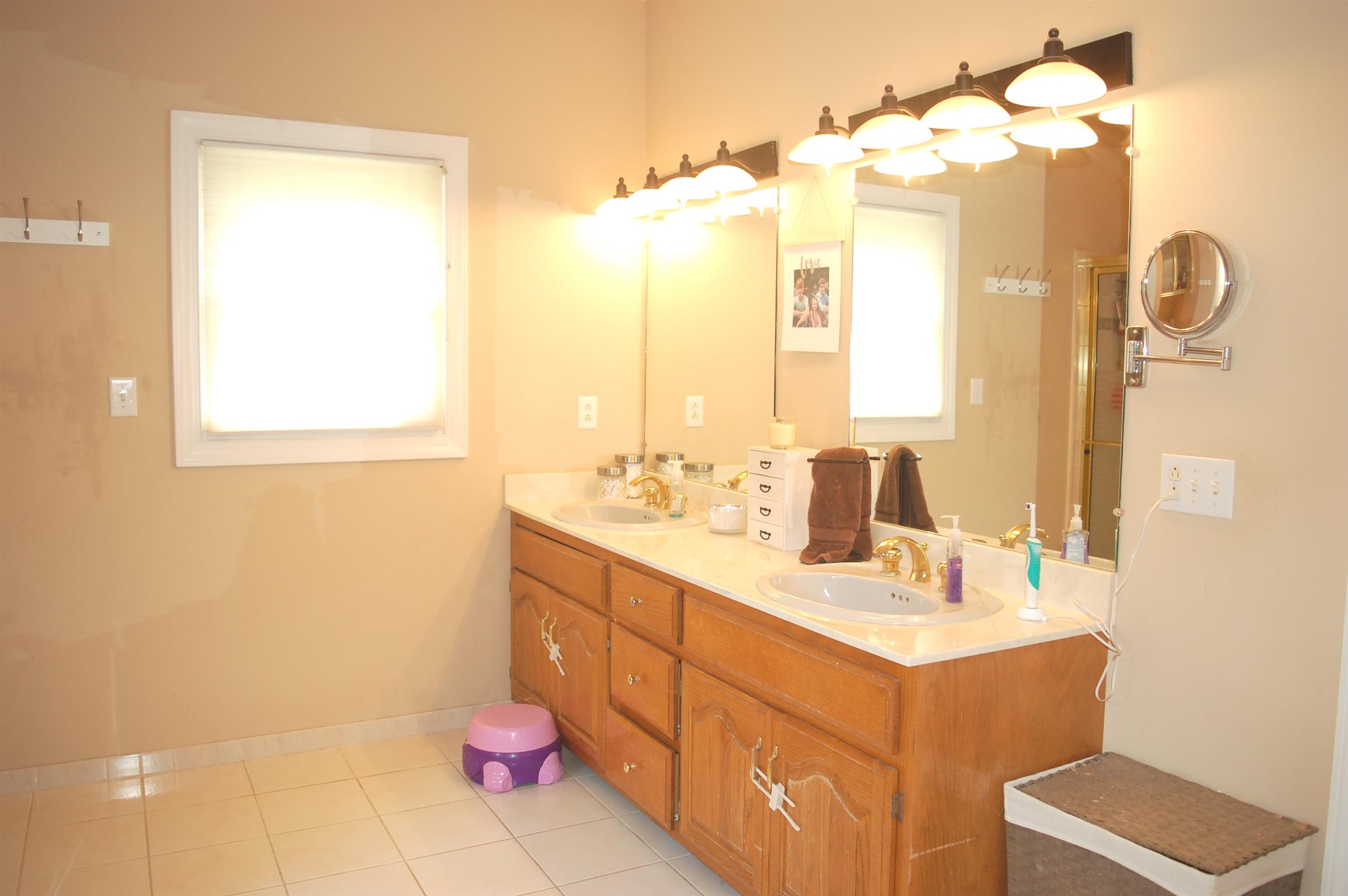 545 Pond Apple Road Clarksville, TN 37043 - Photo 11 of 22 Double Vanities Leave Extra Counter Space With Large Mirrors!