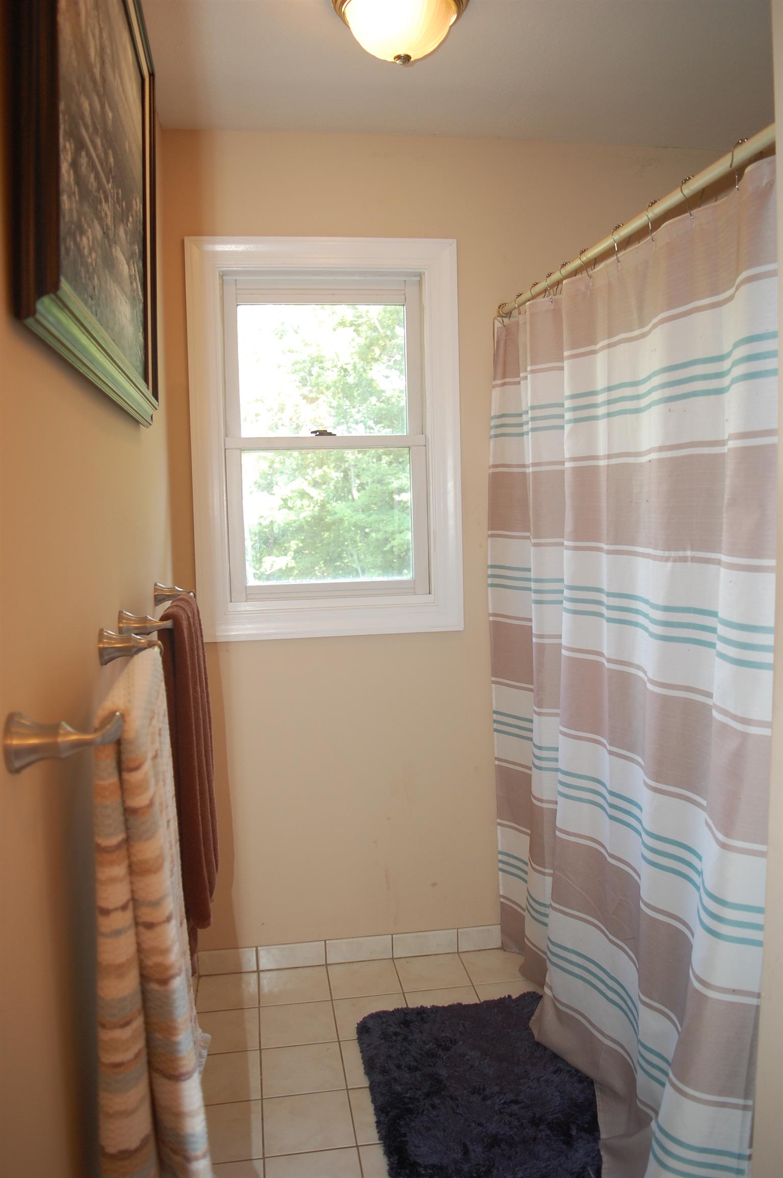 545 Pond Apple Road Clarksville, TN 37043 - Photo 18 of 22 The Jack & Jill Bathroom Shower Provides Privacy Throughout The Bathroom!